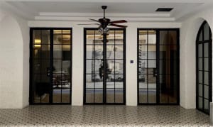 Modern living room interior design featuring metal and glass doors