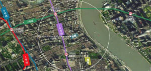 Aerial map of an urban area with multiple subway lines and a river.