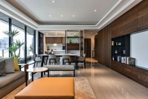 Modern living room featuring a combination of wood and concrete materials.