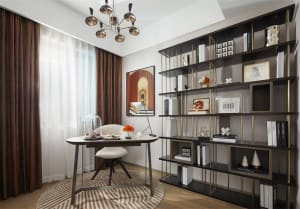 A modern office space featuring a desk and large shelves.