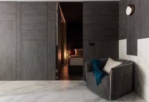 Modern living room featuring metallic cabinet and marble flooring