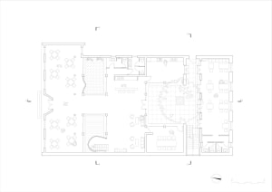 Floor plan of a coffee shop with tables, chairs, and a central open area.