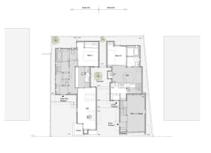 A detailed 2D architectural drawing showing the layout of a modern residential building.