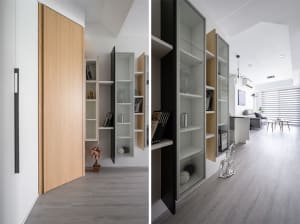 A modern home interior with artistic wooden storage panels and shelves.