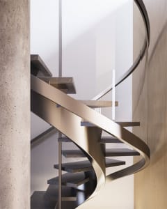 A modern interior design featuring a metal and concrete staircase with curved steps and a sleek, minimalist aesthetic.
