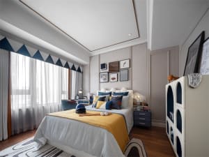 Modern bedroom with fabric bedding, wood flooring and glass window.