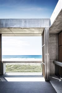 Modern residential porch overlooking ocean