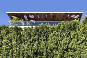 Modern residential home featuring a contemporary exterior with wooden elements.