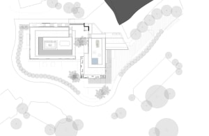 A modern house plan layout with various rooms and outdoor spaces.