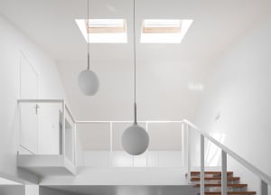 Modern minimalist staircase featuring white materials, viewed as a floor plan.