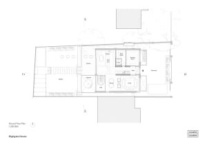 Floor plan of a modern residential building with concrete and glass elements.