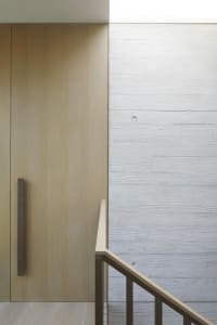 Modern staircase with concrete and wood elements