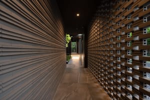 Modern interior with wooden walls and stone floor.