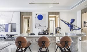 Modern kitchen bar featuring a marble countertop