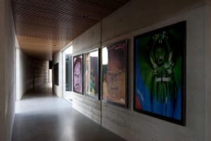 A modern installation featuring concrete sculptures.
