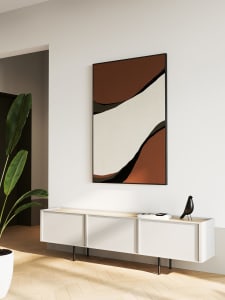 A minimalist living room featuring clean lines, organized decor, and a white color scheme with accent pieces in darker tones.