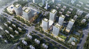 Aerial view of a modern urban development with commercial buildings and residential areas.