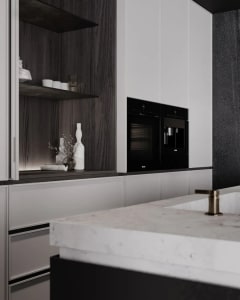 Modern minimalist residential kitchen with marble countertops, wooden cabinets, and stainless steel appliances.