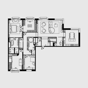A black and white floor plan depicting a modern apartment layout on paper.