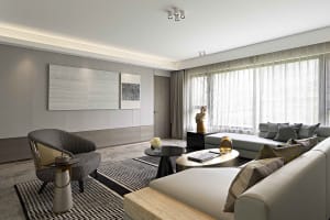 Contemporary living room featuring modern furnishings and decorative elements in a minimalist aesthetic.