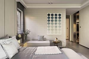 A modern minimalist bedroom with a botanical theme, showcasing neutral tones and a geometric circle pattern on the wall.