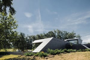 A modern condo showcasing concrete construction, emphasizing contemporary design elements and minimalist aesthetics within a 