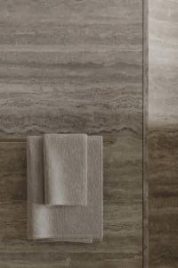 Modern bathroom accessories featuring metal elements