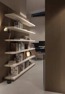 A modern home office with floating wooden shelves filled with books and decor.