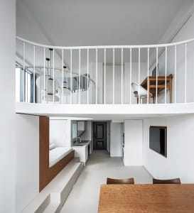 A modern residential home with a white interior and minimalist design.