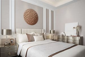 Modern bedroom featuring contemporary design elements with metal headboard, beige walls, and gold accents.