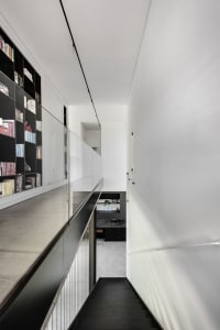 Staircase with minimalist design, featuring a concrete material.