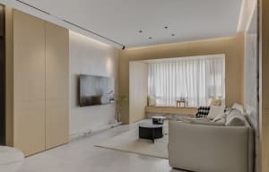 A minimalist living room with wood paneling, a white sofa, and a large window