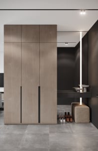 Modern interior design featuring a tall wooden closet with a minimalist design and integrated lighting.