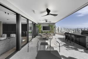 Modern terrace lounge featuring concrete material and contemporary design elements.