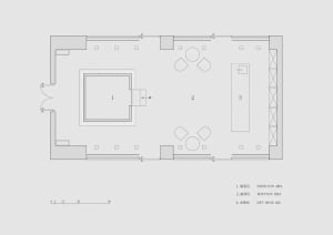 A floor plan of a modern reception hall with a central open space, reception desk, and seating areas.
