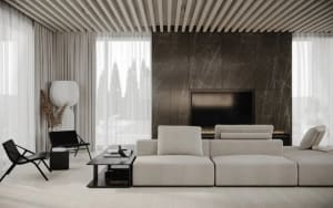 A modern living room with concrete and marble materials.