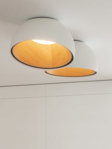 Two modern metallic dome-shaped ceiling lights