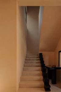 Concrete staircase with minimalist design elements in an interior setting