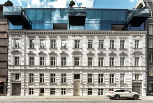 Modern white building with glass addition
