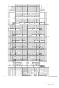 Modern residential building with extensive glass facade and green plants on balconies
