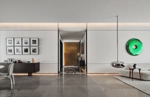 A modern interior space with a concrete floor and minimalist design elements.