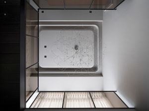 Modern interior design featuring a wire lighting installation.