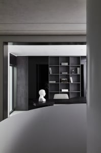 Modern office space with concrete, glass, and metal finishes.
