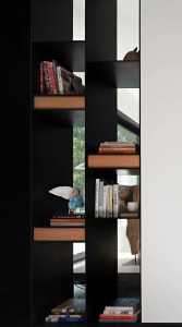 A modern library featuring black wooden shelves with metal accents.