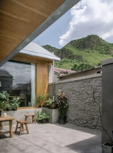 Minimalist architecture featuring concrete and wood materials