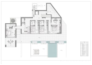 Floor plan of a modern residential building with concrete and glass materials.