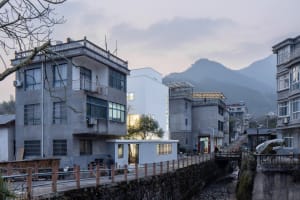 Urban landscape featuring modern buildings constructed with concrete, brick, and metal.