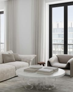 Modern living room with minimalist design, featuring a white fabric sofa and glass coffee table, large windows with light-col