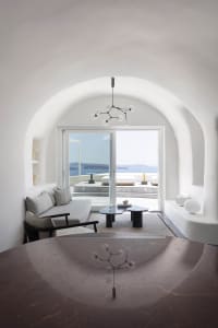 A modern white concrete interior with a minimalist design.