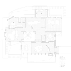 Monochrome architectural plan of a modern residential interior with white lines and a minimalist aesthetic.